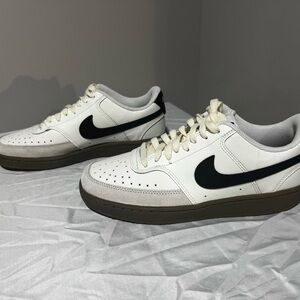 Nike White Sneakers with Black Swoosh and Brown Midsole